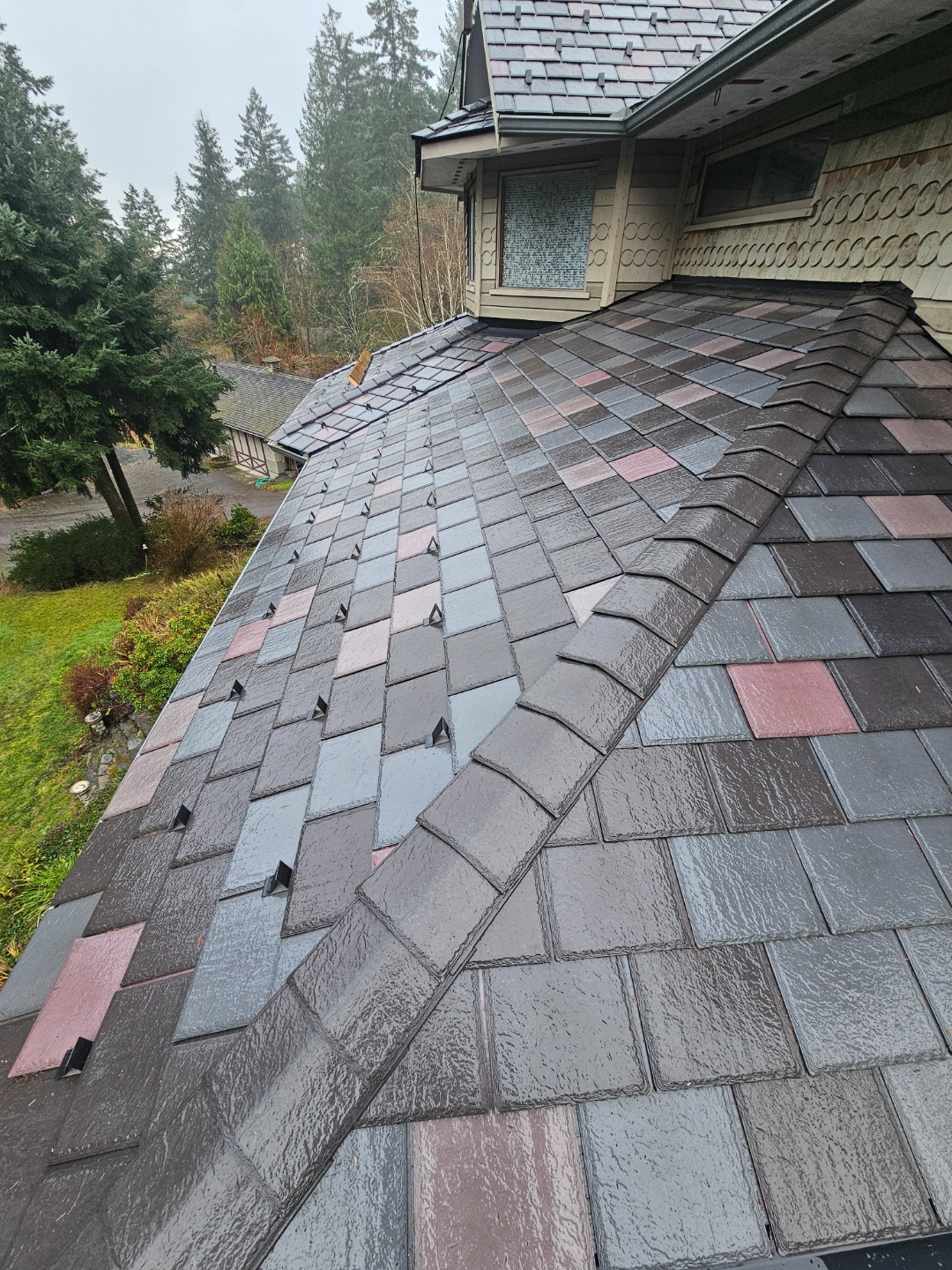 EnviroSlate synthetic slate detail — snow guards and hip layout, Victorian dormer