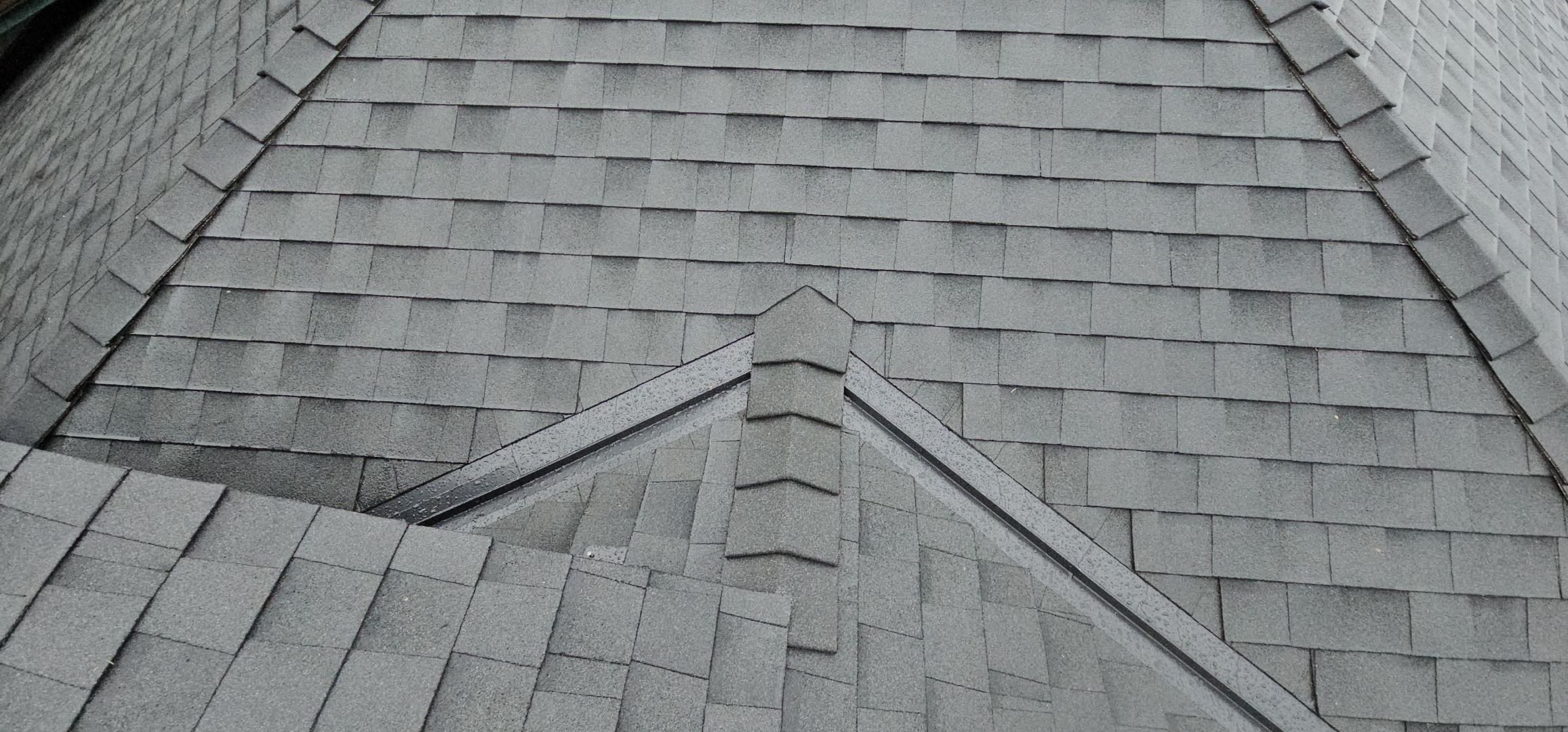 Salt Spring Island — tight hip cap detail, converging hips, asphalt shingle craftsmanship